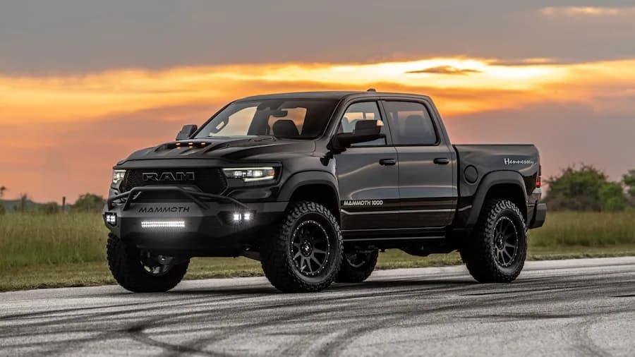 Two people moving boxes