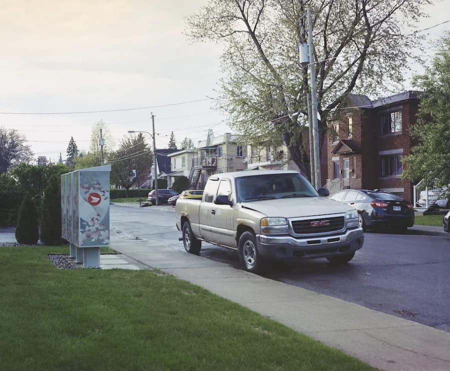 Two people moving boxes